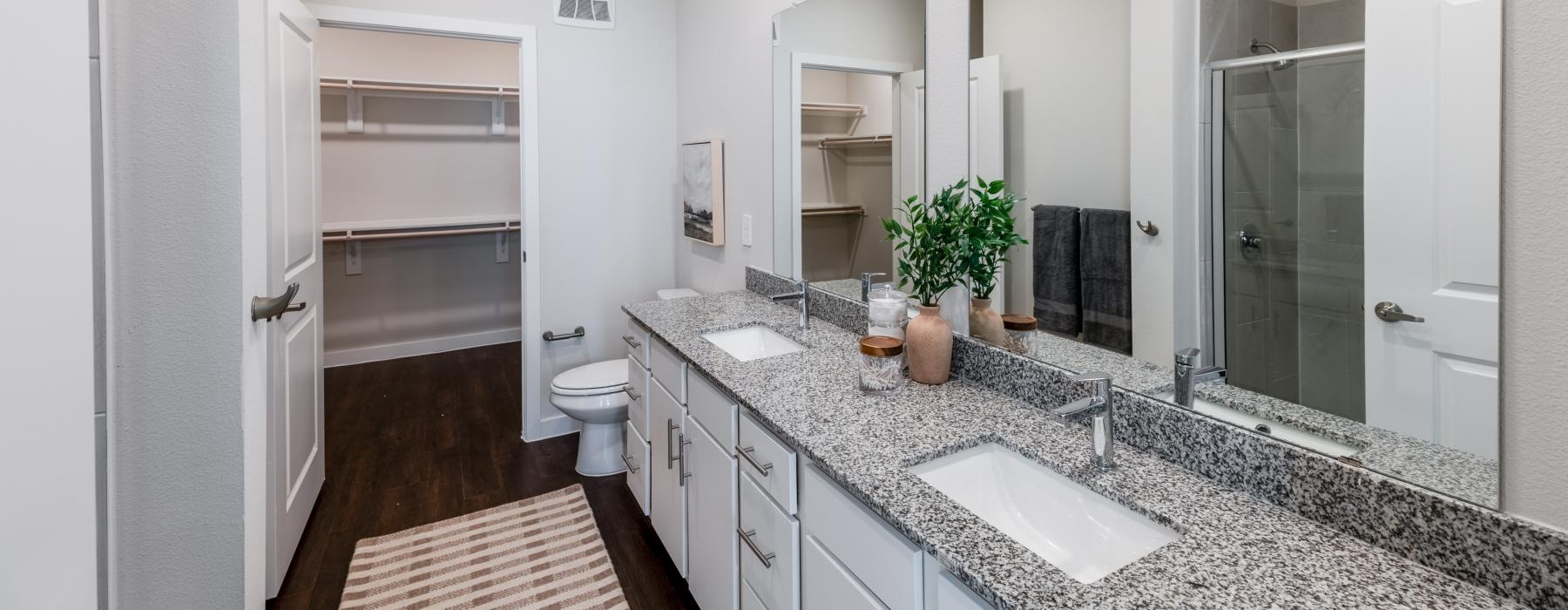 a bathroom with a marble countertop