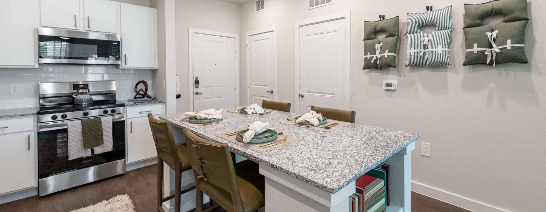 Kitchen island with cabinetry and seating